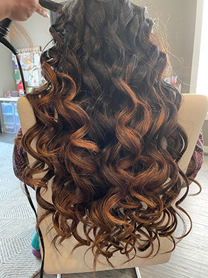 beautiful curled hair for a maternity photo session in Calgary