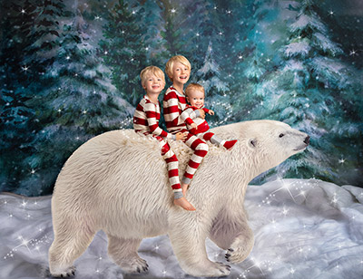 3 kids riding a magical polar bear at studio james photography